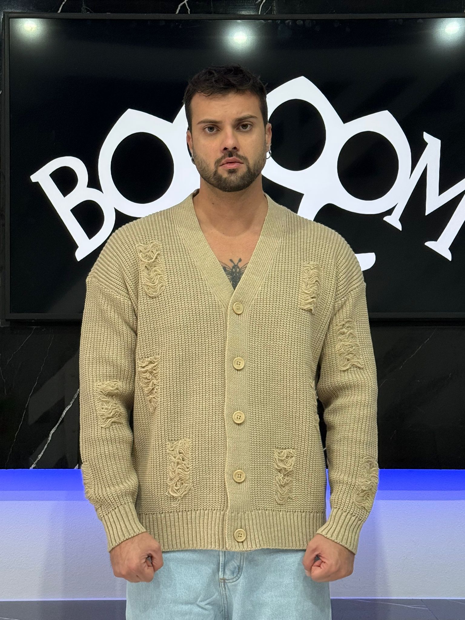 Cardigan con rotture