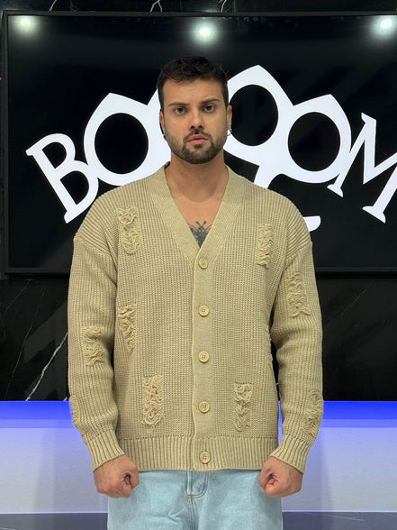 Cardigan con rotture