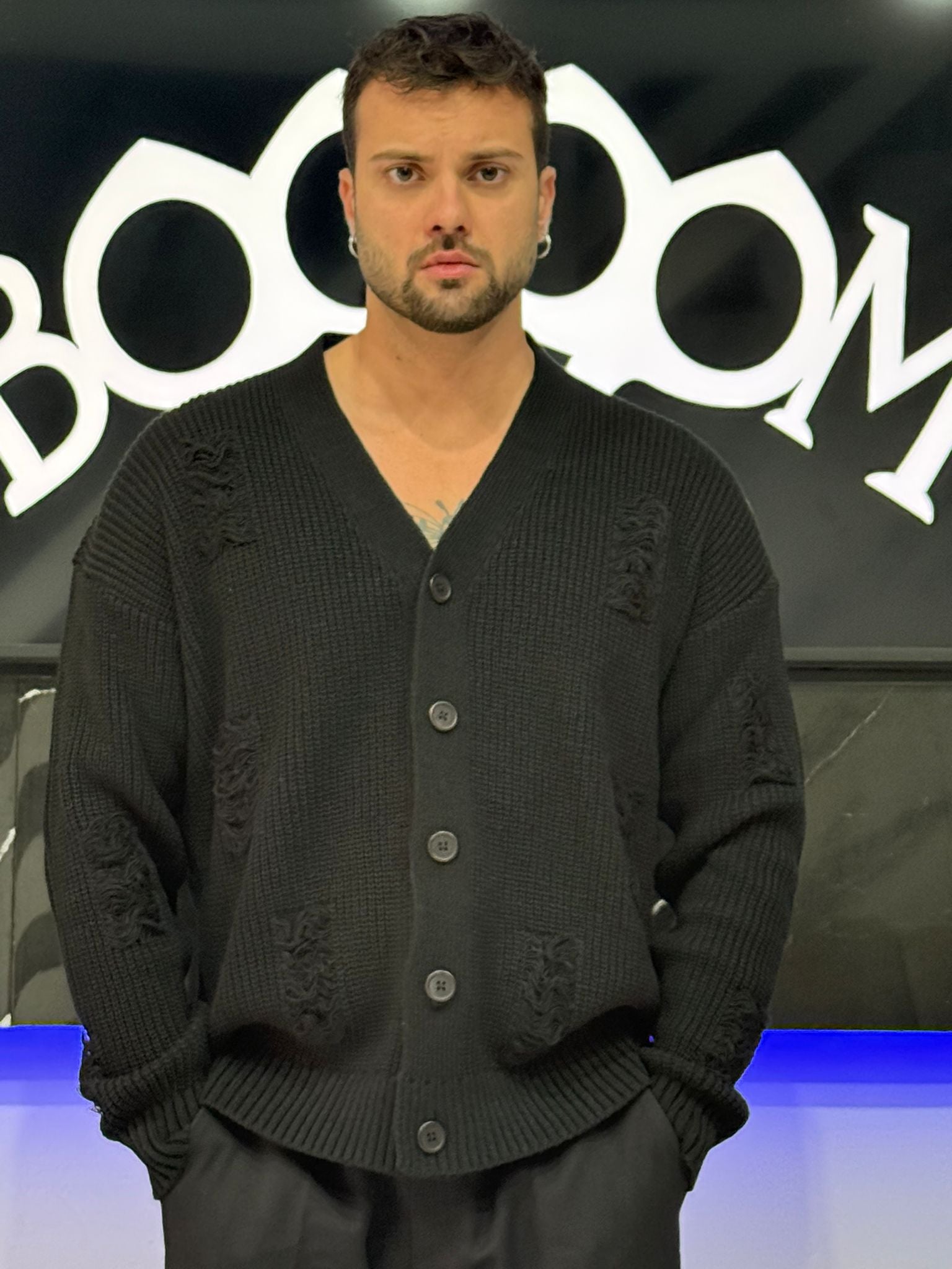 Cardigan con rotture